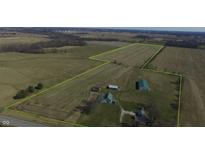 Aerial view of a house, barn, and large lot of land at 1545 S Us 421, Zionsville, IN 46077