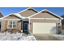 Stunning ranch home with stone accents and a welcoming front porch at 1962 Fairmount Dr, Greenfield, IN 46140