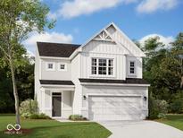 Two-story home with white siding, gray door, and two-car garage at 5147 Rolling Meadow Blvd, Indianapolis, IN 46237