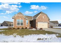 Brick ranch home with attached garage and landscaped lawn at 3844 Albert Ln, Bargersville, IN 46106