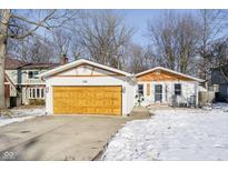 Charming ranch home with attached garage and landscaped yard at 769 Iron Bridge Rd, Cicero, IN 46034