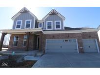Beautiful two-story home with brick and siding, featuring a spacious two-car garage at 5511 Sienna Ct, Brownsburg, IN 46112