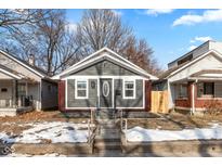 Recently renovated home with gray siding and a small front yard at 2320 Spann Ave, Indianapolis, IN 46203