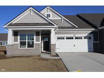Charming home featuring stone accents, neutral siding, and a two-car garage in a well-maintained community at 3617 Wrangler Dr, Bargersville, IN 46106
