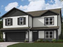 Two story home with white siding, dark gray accents, and a two-car garage at 116 Marble Wood Dr, Danville, IN 46122
