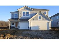 New construction two-story home with a two-car garage and unfinished landscaping at 5839 Sunstone Rd, Indianapolis, IN 46239