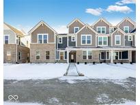 Attractive 3-story townhome with gray siding and stone accents at 5755 Cr W 750 N, McCordsville, IN 46055