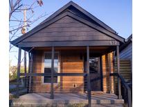 Charming craftsman style home with modern exterior finishes and a welcoming front porch at 617 Marion Ave, Indianapolis, IN 46221