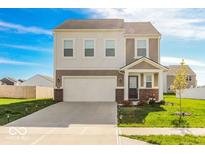 Two-story house with a brick and beige exterior, a two-car garage, and a landscaped lawn at 419 Bluestem Ln, Whiteland, IN 46184