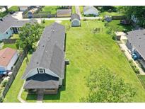 Overhead view of home with large yard and mature trees in a quiet, residential neighborhood at 1175 Central Ave, Noblesville, IN 46060