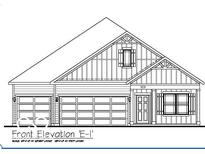 Detailed line drawing of a home's front elevation with a two car garage, entry door, and window at 5909 Agogo Way, Greenwood, IN 46143