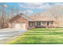 Attractive brick home with a two-car garage and a well-maintained lawn at 3510 E Copperstone Rd, Martinsville, IN 46151