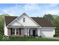 Charming one-story home with brick and white siding, and a two-car garage at 1020 Stonehaven Dr, Indianapolis, IN 46239