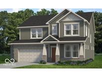 Two-story home with brick and siding exterior, two-car garage, and landscaping at 1097 Stubble Run, Danville, IN 46122