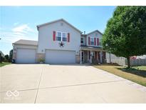 Two-story house with gray siding, red shutters, and a two-car garage at 833 Palisades Ct, Greenwood, IN 46143