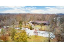 Secluded long home nestled in the woods near a pond at 9600 N 500 E, Pendleton, IN 46064