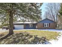 Brick ranch home with attached garage and mature tree at 1269 Casco Bay Cir, Cicero, IN 46034