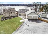 Lakefront property with double garage and spacious yard at 3003 E 56Th St, Indianapolis, IN 46220