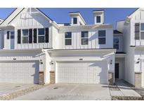 Charming two-story home with a two-car garage and well-manicured lawn at 7254 Shroyer Way, Noblesville, IN 46062