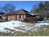 Brick ranch home with snow-covered lawn at 1114 Willow Springs Blvd, Brownsburg, IN 46112