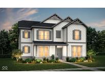 Two-story home with gray siding, landscaping, and a walkway at 14366 Bishop Birch Pl, Carmel, IN 46074