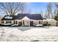 Brick ranch home with snow-covered lawn and attached garage at 3521 Manchester Rd, Anderson, IN 46012