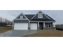 Charming single-Gathering home with a two-car garage, covered entry, and stylish gray siding at 4976 Elaine Ct, Noblesville, IN 46062