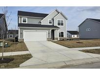 Charming two-story home with a gray exterior, attached garage, and a well-maintained lawn at 19723 Atwater Ave, Sheridan, IN 46069