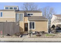 Charming multi-level home with a well-maintained yard and inviting entrance at 5183 Fairway Dr, Avon, IN 46123