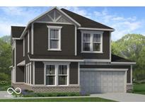 Two-story home with gray siding, brick accents, and a two-car garage at 15994 Meadow Frost Ct, Fishers, IN 46037