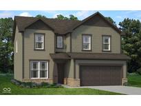 Charming two-story home featuring an attached two-car garage and a well-manicured lawn with garden at 349 N Post Oak Dr, Mooresville, IN 46158