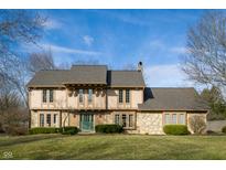 Charming two-story home featuring a landscaped yard, stone accents and a newer roof at 662 Morningside Dr, Zionsville, IN 46077