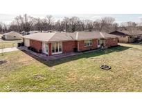 Brick ranch house with a large yard at 2605 W 39Th St, Anderson, IN 46011