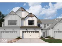Two-story modern farmhouse with white siding, a large garage, and landscaping at 4205 Douro Trl, Westfield, IN 46062