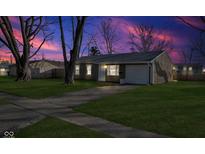 Charming single-story home featuring a well-maintained lawn and an attached single car garage at 6007 Westhaven Dr, Indianapolis, IN 46254