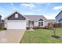 Brick ranch home with white accents and a two-car garage at 1402 W Limestone Way, Fortville, IN 46040