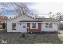 Charming ranch home with brick accents and a well-maintained lawn at 139 Windemere Rd, Whiteland, IN 46184
