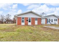 Brick ranch home with a front yard at 1462 Golay St, Indianapolis, IN 46203