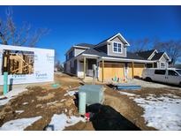New construction home exterior showcasing modern design and gray siding at 196 Northwalk Cir, Westfield, IN 46074