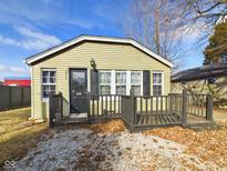 Charming single-story home with a cozy front porch and quaint curb appeal at 2414 W 16Th St, Anderson, IN 46016