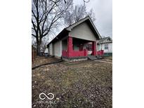 One-story house with red brick accents and a covered porch at 1154 N Belleview Pl, Indianapolis, IN 46222
