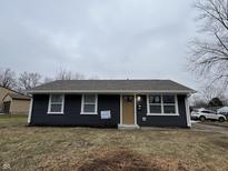 Charming one-story home featuring a well-maintained yard and cozy front porch at 3901 Della Ct, Indianapolis, IN 46235
