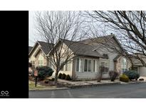 Charming single story home with stone accents and mature landscaping providing great curb appeal at 1016 Laurelwood Ln # D, Greenwood, IN 46142