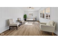 Bright and airy living room with neutral decor and lots of natural light at 453 Carol Dr, Greenwood, IN 46143