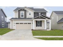 Charming two-story home features manicured lawn, neutral color scheme, and attached two car garage at 5315 Noble Crossing W Pkwy, Noblesville, IN 46062