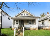 Charming single-Gathering home with inviting front porch and well-maintained lawn at 2138 N Dexter St, Indianapolis, IN 46202