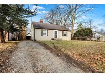 Charming single-story home with a cozy front yard and a quaint, inviting facade at 3636 Lasalle St, Indianapolis, IN 46218