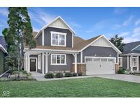 Charming two-story home with a well-manicured lawn and inviting front porch at 159 Cline St, Westfield, IN 46074
