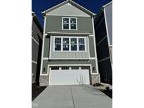 Charming new construction with two-car garage and craftsman-style details, perfect for modern living at 15403 Mystic Rock Dr, Carmel, IN 46033