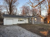 Charming single-story home with mixed siding, attached garage, and inviting curb appeal at 2666 E 500 N, Whiteland, IN 46184